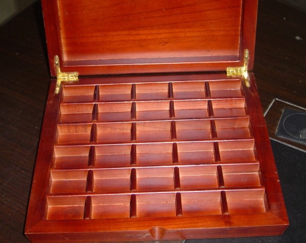 Stained custom wooden tea box with a hinged top and dividers, available in bulk for premium packaging, branded retail storage, and specialty product presentation.